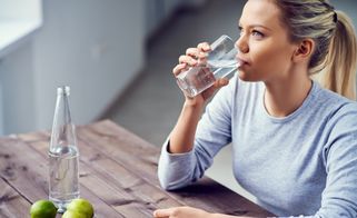 Water fasting woman drinking water
