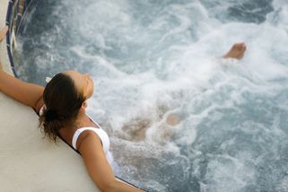 lady enjoys a hydromassage