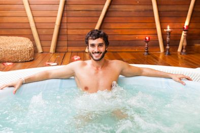 a man enjoys thermotherapy in his jacuzzi